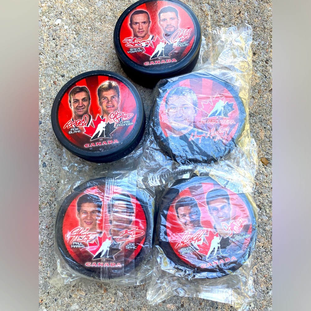 2002 Team Canada Olympic hockey puck set of 5
